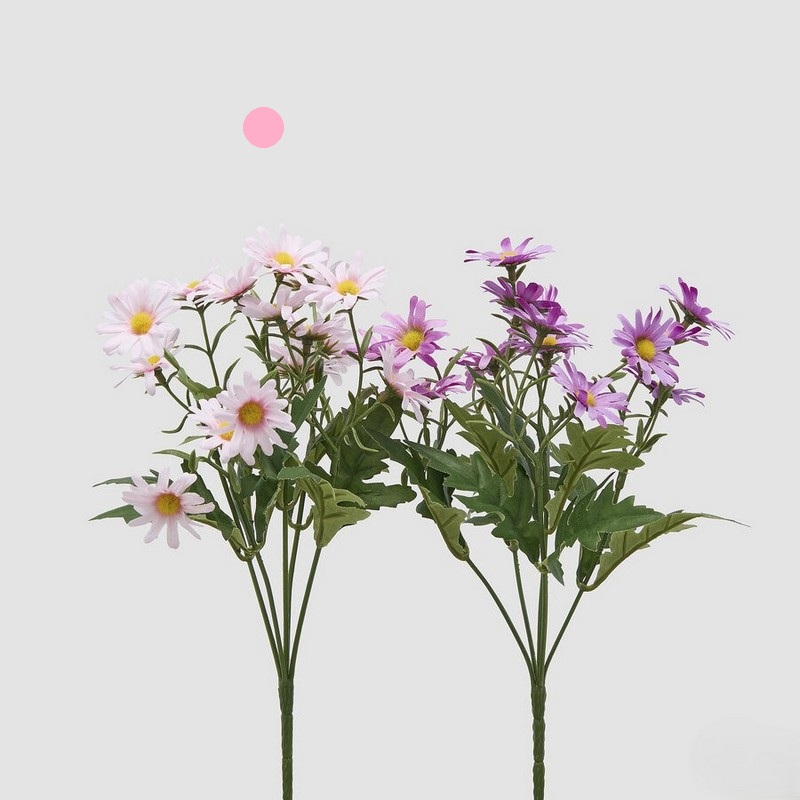 Cespuglio di margherite rosa artificiali con foglie